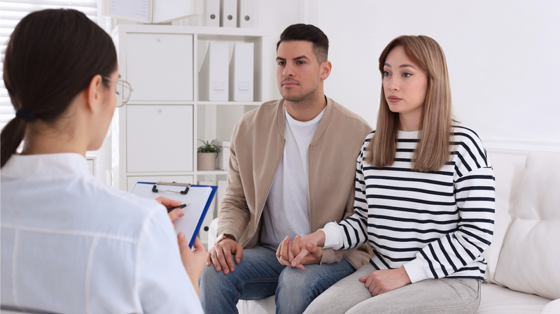 couple consulting with doctor about sexual health