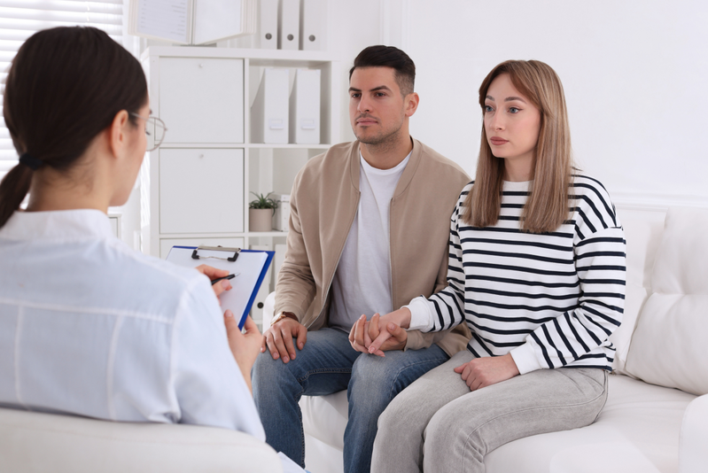 couple talking to doctor about sexual health